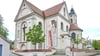 Das digital auf ein Bild der Kirche montierte Banner ist Teil eine Aktion für den Erhalt des Adlers in Kißlegg.