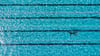 ARCHIV - 17.05.2017, Hamburg: Ein Badegast schwimmt im Freibad im 50-Meter-Becken (Luftaufnahme mit einer Drohne). Die Gewerkschaft ver.di ruft am 05.07.2019 die Beschäftigten von «Bäderland» zum Warnstreik auf. Foto: Axel Heimken/dpa +++ dpa-Bildfun