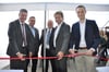  Die Geschäftsführer der Firma ETP Montage GmbH, Jan Schloßmacher (Zweiter von links) und Arnulf Paul (Dritter von links) haben es geschafft: Am Samstagmittag wurde die Niederlassung ihrer Elektroinstallationsfirma auf der Haid eröffnet. Die Bundesta