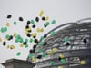 Luftballons in den Jamaika-Farben fliegen in Berlin neben dem Reichstag. Foto: Michael Kappeler