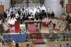  Patrozinium in Reute – zwei Chöre, zehn neue Ministranten und mehrere Pfarrer versammeln sich im Chorraum.