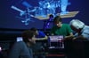 Das Produktionsteam (v. l. Michael Bischof, Steven Rohrhirsch, Mario Bertsch und Heinz Rohrhirsch) bei der Arbeit. Darüber schwebt die ISS.