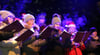 Der Philharmonische Chor lud mit traditionellen Weihnachtliedern zum Mitsingen ein.
