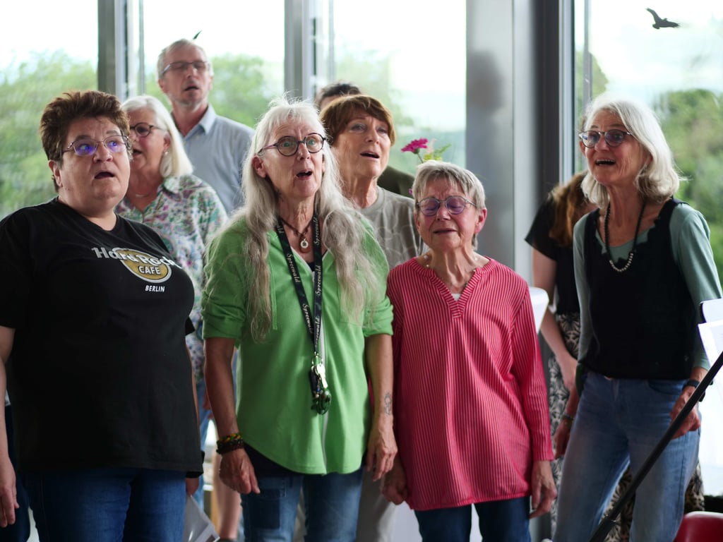 Gospel choir Rejoice performing at the certification ceremony